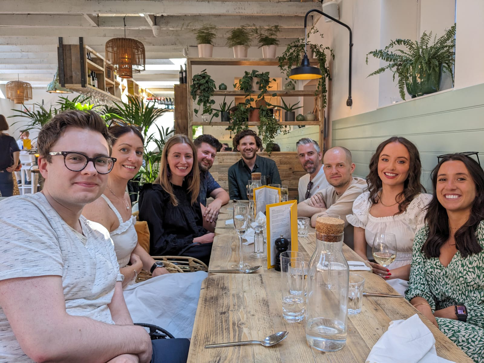 Contagious staff having lunch in a restaurant 